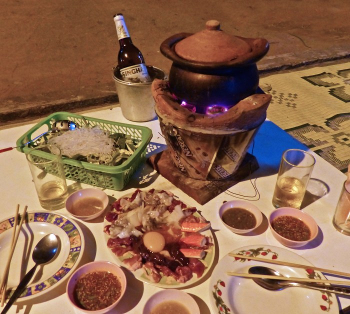 Dim Tum - boiling pot and raw beef, egg, and veggies.