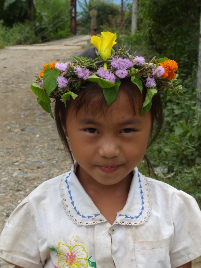 Little girl with flowers