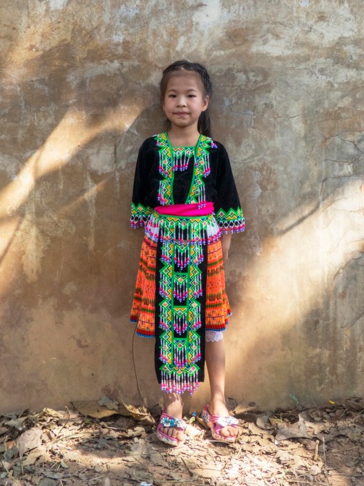 Little girl against the wall