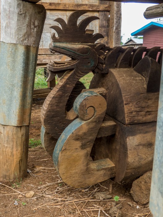 Ornate snake carved into Shaman casket