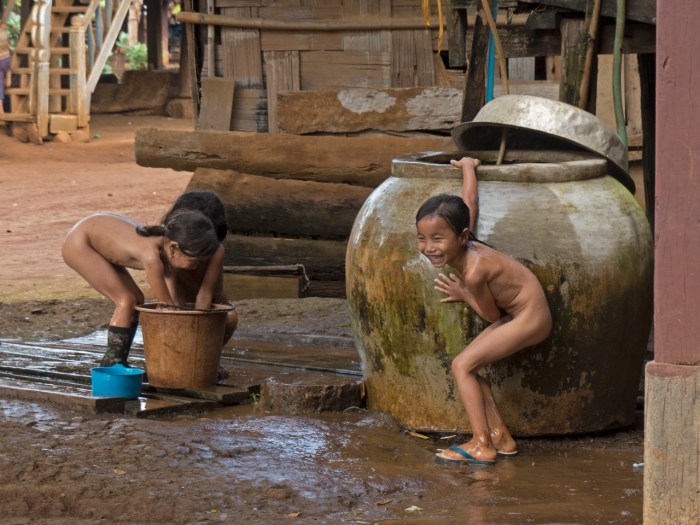 Kids bathing and playing happily