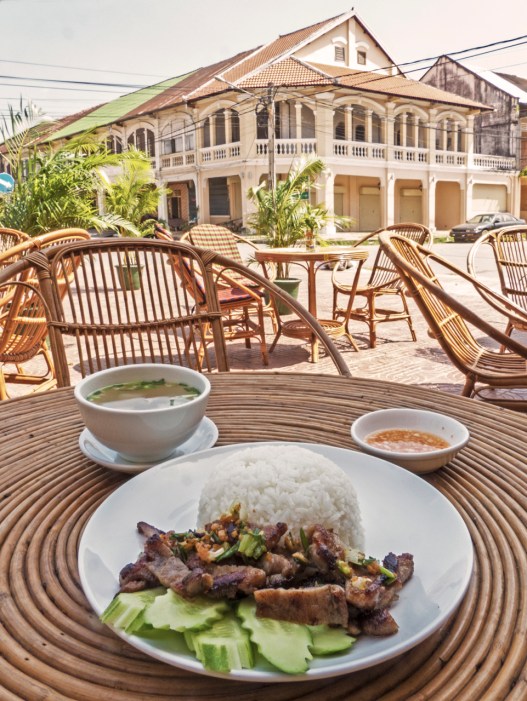 Carmelized Pork and Rice in front of French Colonial Building