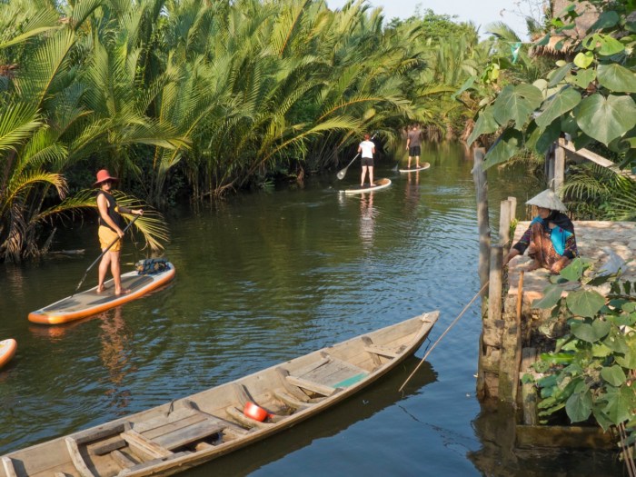 Paddle boards meet Muslim fishing lady
