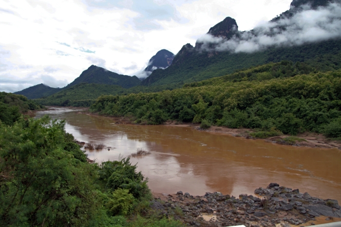 Windy Brown River and Limestone Mountains
