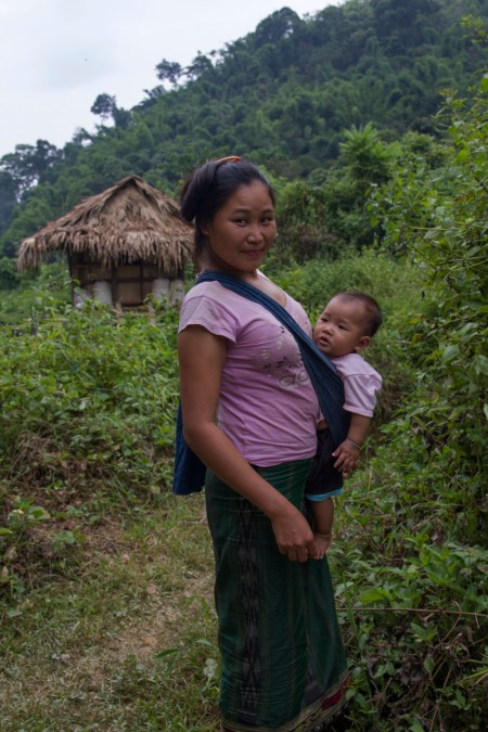 Woman poses for Michel with her child